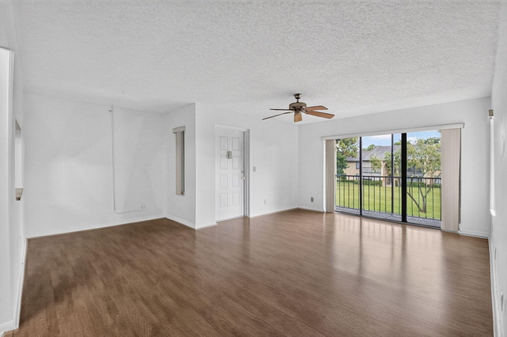 Photo of 720 SUNNY PINE Way #G2, Greenacres, FL 33415 (MLS # B26068947)