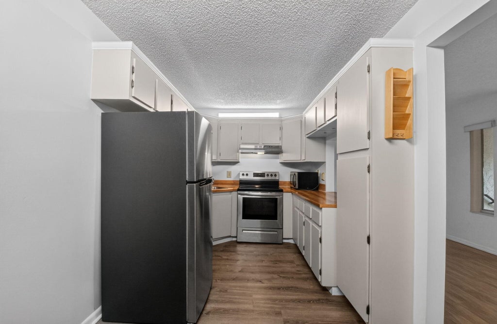 Photo of 720 SUNNY PINE Way #G2, Greenacres, FL 33415 (MLS # B26068947)