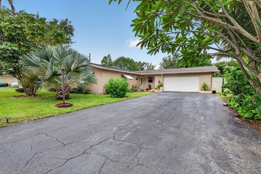 Photo of 167 NW 49TH Avenue, Plantation, FL 33317 (MLS # B26083722)