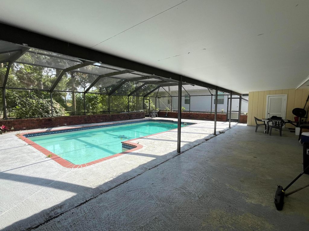 Photo of 203 E Easy Street, Fort Pierce, FL 34982 (MLS # R11088405)