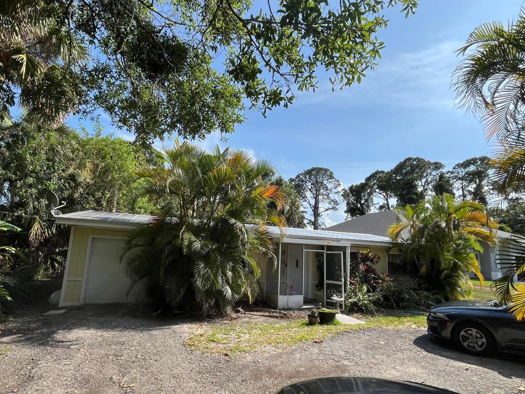 Photo of 203 E Easy Street, Fort Pierce, FL 34982 (MLS # R11088405)