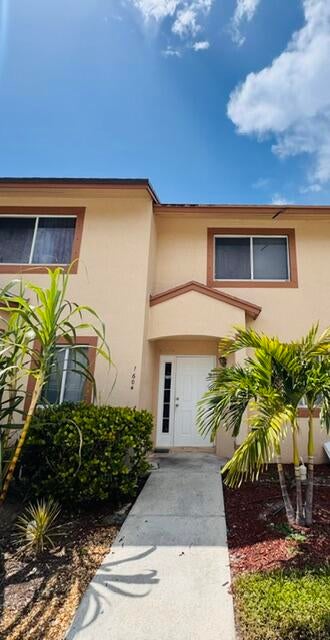 Photo of 1604 Lakeview Drive W, Royal Palm Beach, FL 33411 (MLS # B26082491)