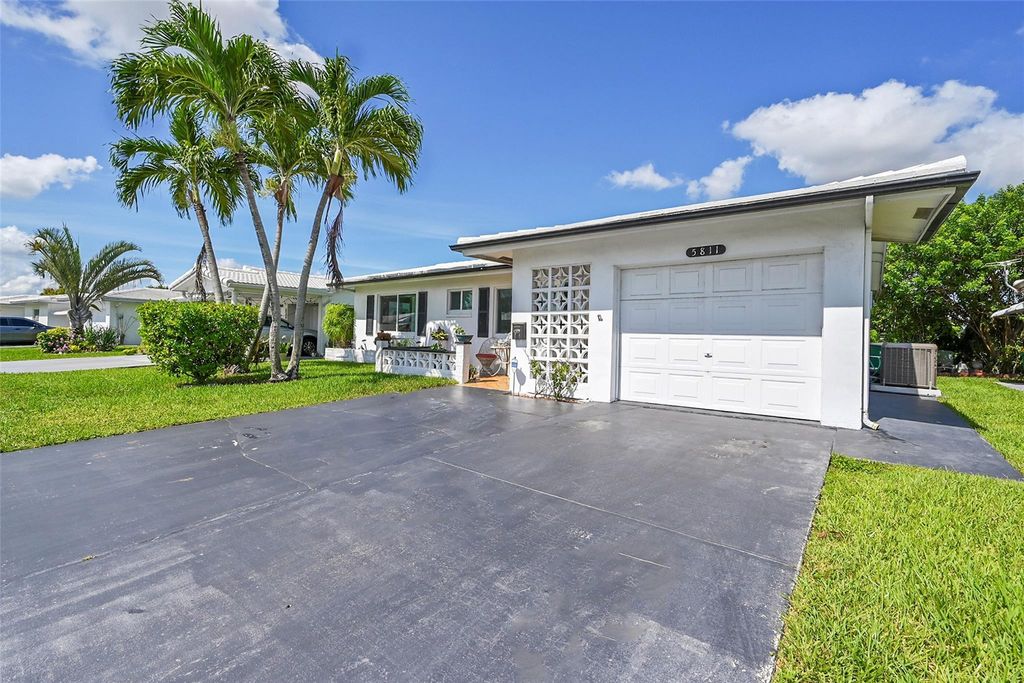 Photo of 5811 NW 84th Ave, Tamarac, FL 33321 (MLS # F10515610)