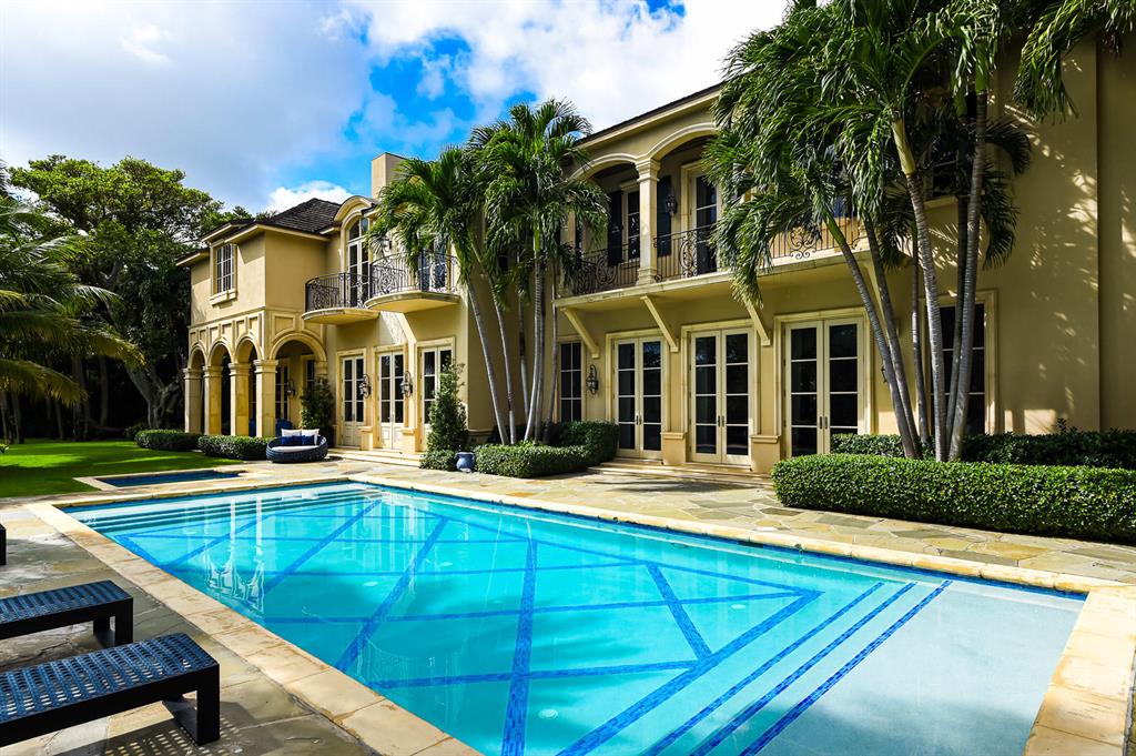 Timelessly elegant with every detail meticulously chosen by one of the top designers in Florida with his wife for their family, this French Country Estate spans 1.23 acres with 375 feet of deep water access, an 80 foot dock, and 16,000 lbs.lift. Nestled amongst the mature oaks and statuesque banyan trees, this private enclave of 65 homes on 77 acres is located in the heart of North Palm Beach, FL. Bordered by Lost Tree Village to the South and Seminole Golf Club to the North, Seminole Landing is a rare address that offers sophisticated Buyers the finest in luxury homes on acre plus lots with navigable water ways and private beach access.