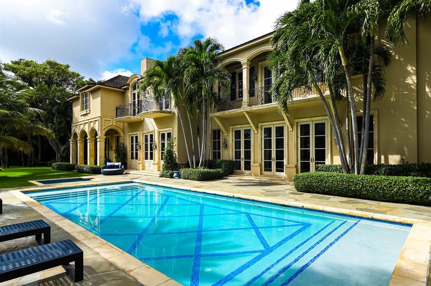 Timelessly elegant with every detail meticulously chosen by one of the top designers in Florida with his wife for their family, this French Country Estate spans 1.23 acres with 375 feet of deep water access, an 80 foot dock, and 16,000 lbs.lift. Nestled amongst the mature oaks and statuesque banyan trees, this private enclave of  65 homes on 77 acres is located in the heart of North Palm Beach, FL.  Bordered by Lost Tree Village to the South and Seminole Golf Club to the North, Seminole Landing is a rare address that offers sophisticated Buyers the finest in luxury homes on acre plus lots with navigable water ways and private beach access.