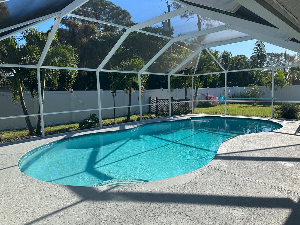 Photo of 633 NE Horizon Lane, Port Saint Lucie, FL 34983 (MLS # R10942813)