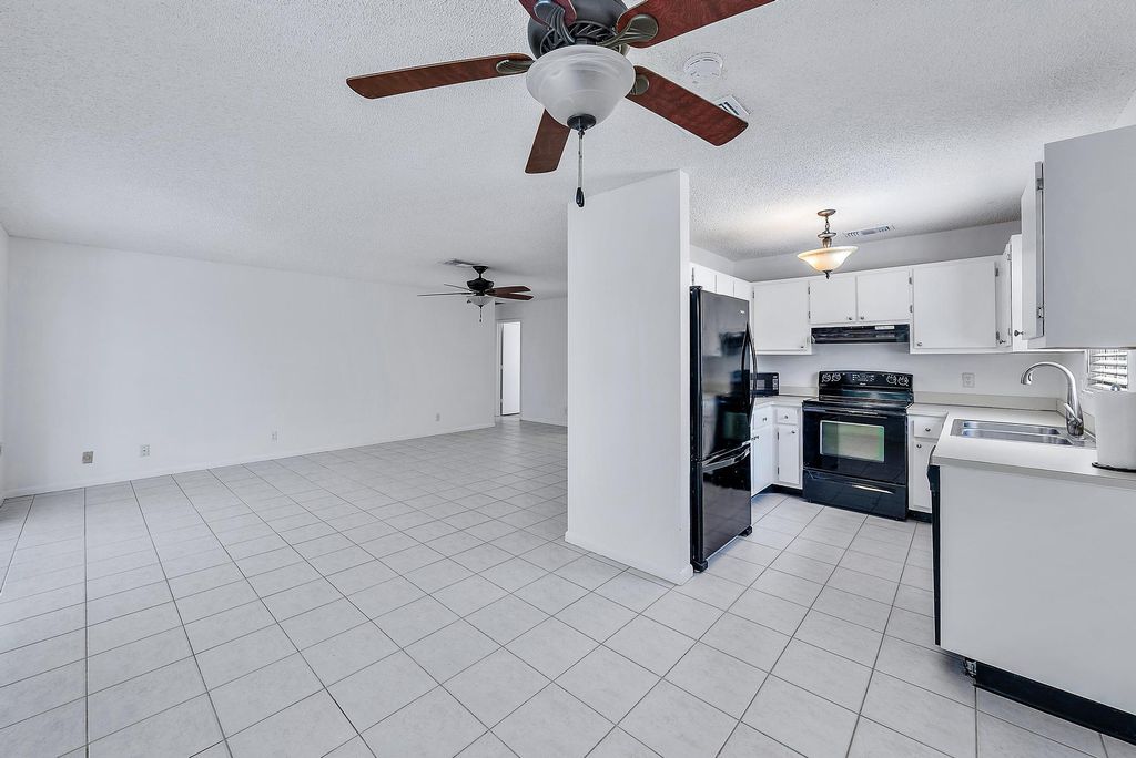 Photo of 210 Woodbridge Drive, Jupiter, FL 33458 (MLS # R10969786)