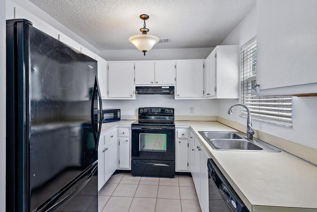 Photo of 210 Woodbridge Drive, Jupiter, FL 33458 (MLS # R10969786)