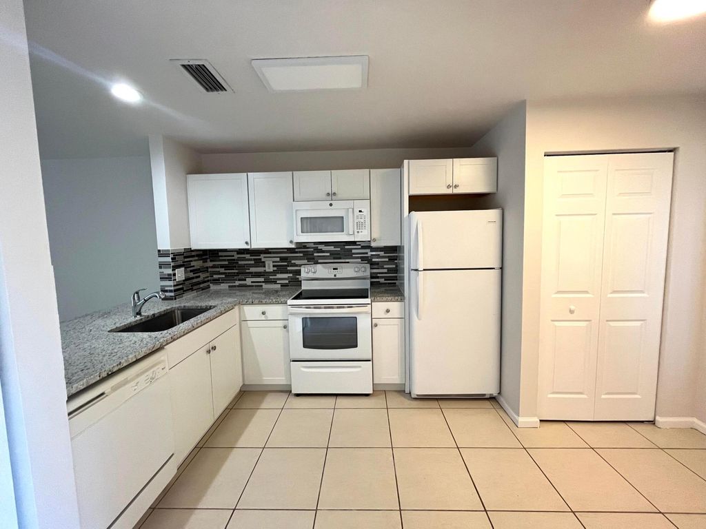 Photo of 930 Summit Lake Drive, West Palm Beach, FL 33406 (MLS # R11152514)