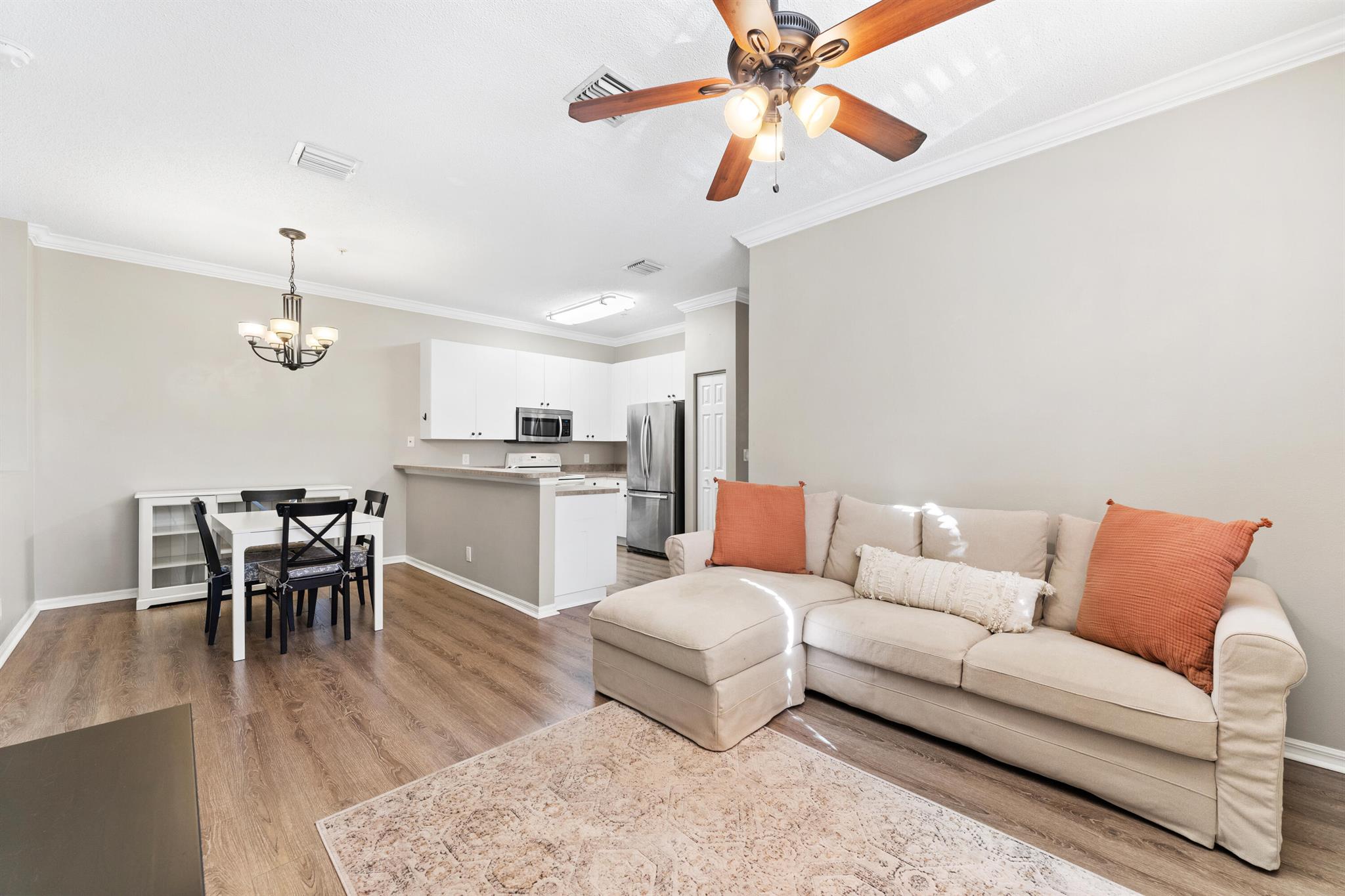 Welcome to 115 Lighthouse Circle in the desirable community of Tequesta Trace! This 2-bedroom, 2-bathroom corner unit with nearly 1,100 sq ft of living space features luxury vinyl flooring, fresh paint and an upgraded laundry area! Enjoy an open kitchen with breakfast bar, a bright living area, and your own private balcony perfect for morning coffee or evening relaxation. The primary suite includes a walk-in closet and en-suite shower! Community amenities include a resort-style pool and playground, all within minutes of Jupiter's beaches, dining, parks, and shops. Easy access to I-95, the Turnpike, and PBI Airport.This move-in ready home won't last -- schedule your showing today!