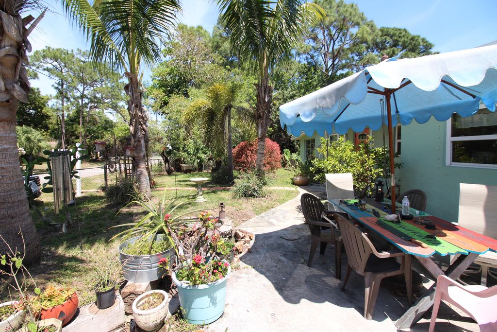 Photo of 5881 SE Wesley Avenue, Stuart, FL 34997 (MLS # R10976801)