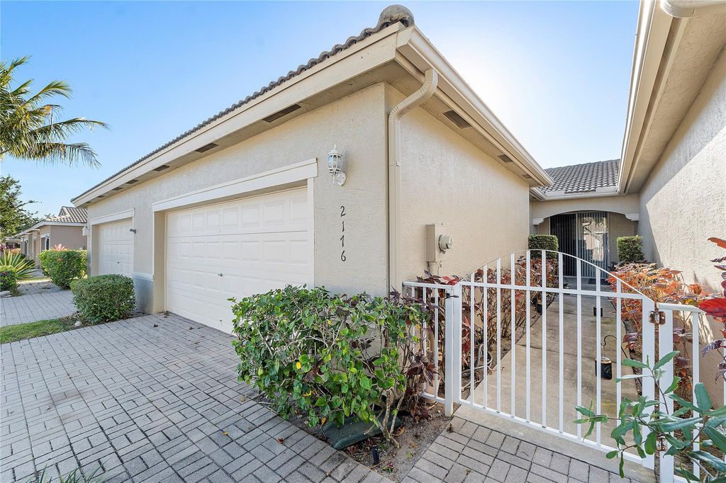 Photo of 2176 Big Wood Cay, West Palm Beach, FL 33411 (MLS # F10436003)