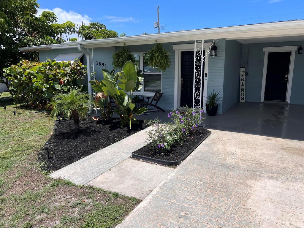 Photo of 1691 NE South Street, Jensen Beach, FL 34957 (MLS # R11046282)