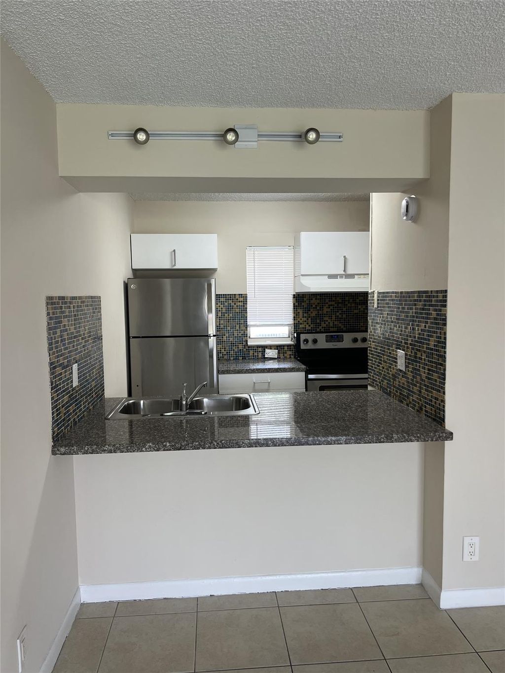 Photo of 10145 twin lakes Dr #C2, Coral Springs, FL 33071 (MLS # F10515003)