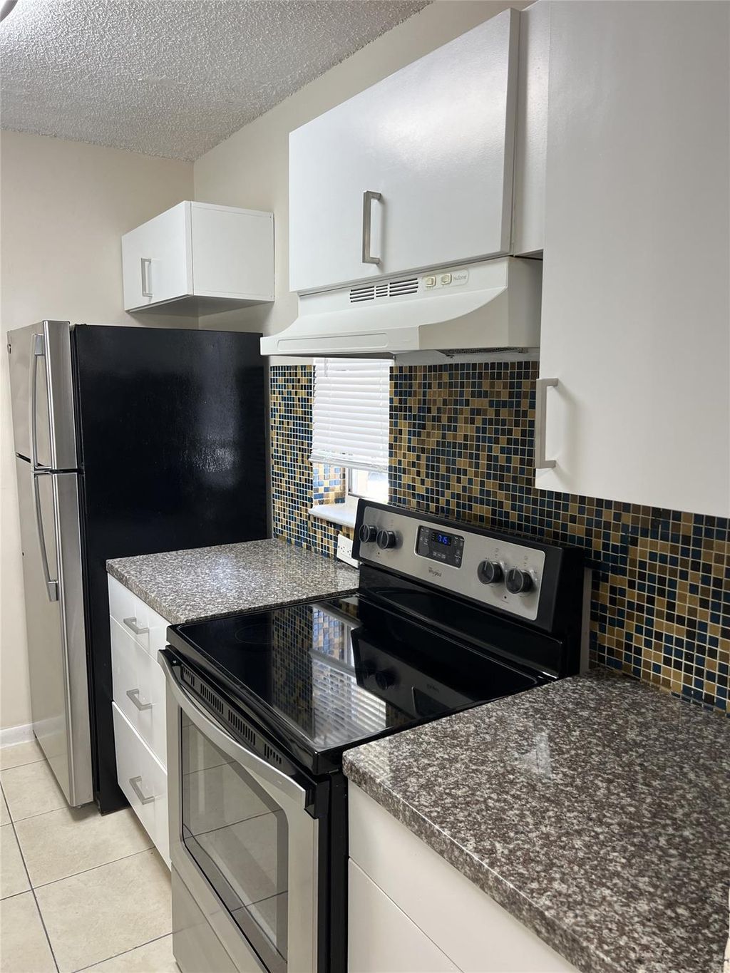 Photo of 10145 twin lakes Dr #C2, Coral Springs, FL 33071 (MLS # F10515003)