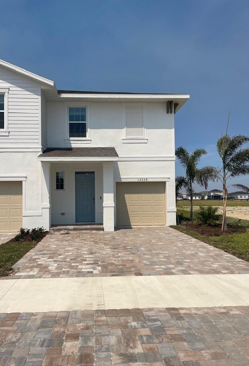 :Central Park Community features 10 Acre amenity area known as ''Inspiration Park'' Just minutes from Shopping, Dining Conveniently located close to I-95. Amenities include.... Resort Style Pool/Splash Park/Dog Park/Basketball/Pickleball/Tennis/Game Room & More. The Pearson two-story townhome in highly sought after ''Central Park'' Community! 3 bedrooms, 2.5 baths, and a 1-car garage. This home includes wood inspired luxury vinyl plank flooring in the main living and wet areas. The open-concept kitchen offers stainless-steel appliances and designer quartz countertops. Upstairs, the primary bedroom has an ensuite bath with quartz and a walk-in shower. Smart home technology package is included; energy-efficient features are just a few reasons not to miss this opportunity.
