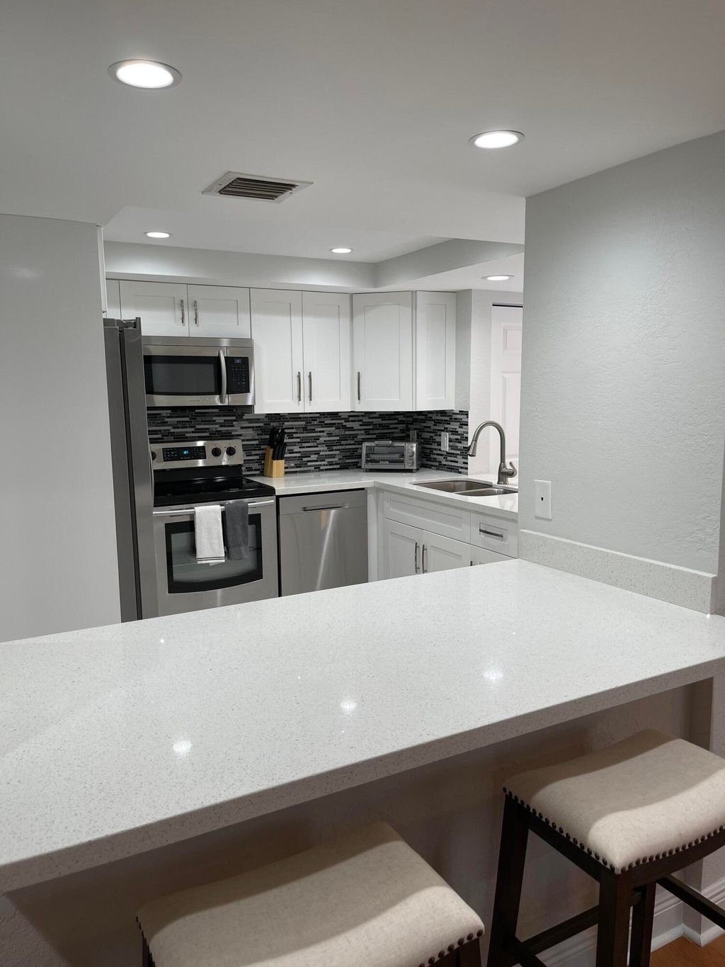 Photo of 1660 Twelve Oaks Way #203, North Palm Beach, FL 33408 (MLS # R10942295)