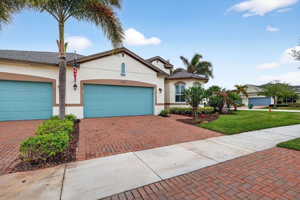 Photo of 11021 Sunrise Lake Drive, Port Saint Lucie, FL 34987 (MLS # B26003711)