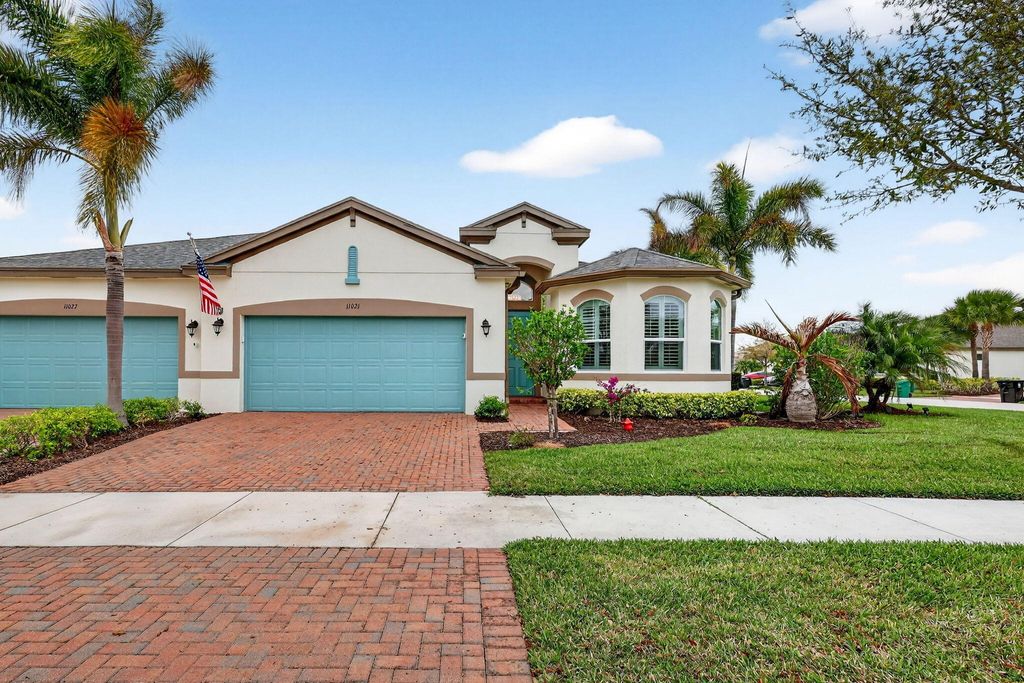 Photo of 11021 Sunrise Lake Drive, Port Saint Lucie, FL 34987 (MLS # B26003711)