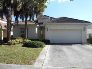 Beautiful 3 bedroom 2 bath home with a 2 car garage in a gated Lake Ida community! This spacious 2,232 square foot home backs up to a canal which connects to Lake Ida, a boater's dream! Nice hard wood floors throughout living areas, tile in kitchen and baths. This home is in excellent condition and is move-in ready! Won't last long!
