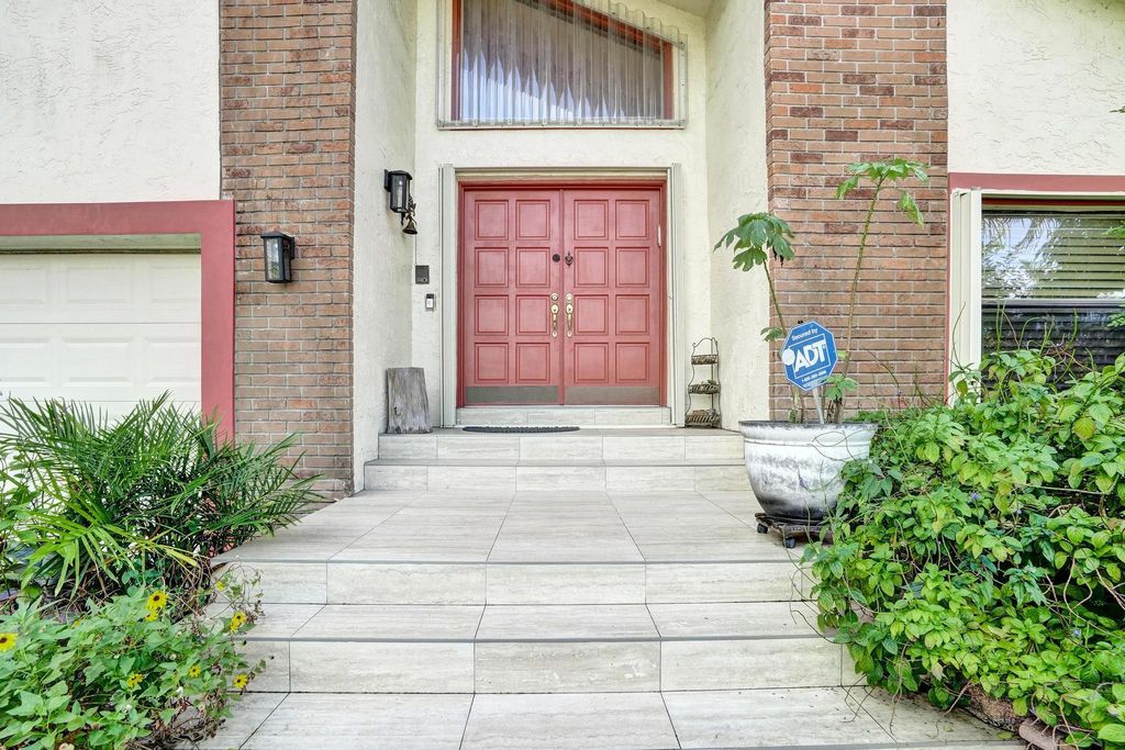 Photo of 7418 NW 49th Street, Lauderhill, FL 33319 (MLS # B26011408)