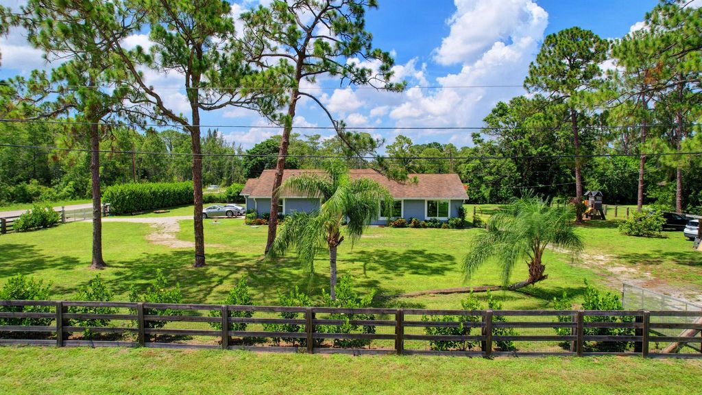 Photo of 16971 W Wiltshire Drive, Loxahatchee, FL 33470 (MLS # R10897823)