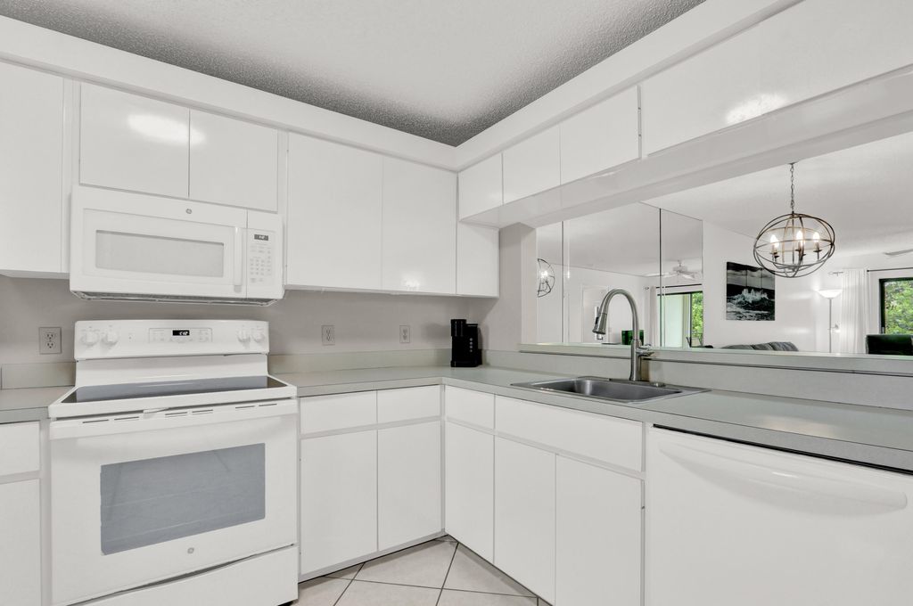 Photo of 115 Bamboo Road #205, Palm Beach Shores, FL 33404 (MLS # R11161375)