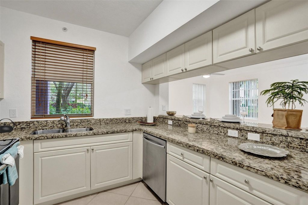 Photo of 6584 W Sample Road #6584, Coral Springs, FL 33067 (MLS # F10549935)