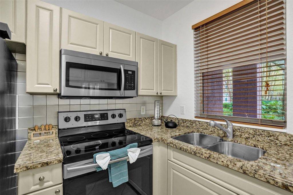 Photo of 6584 W Sample Road #6584, Coral Springs, FL 33067 (MLS # F10549935)