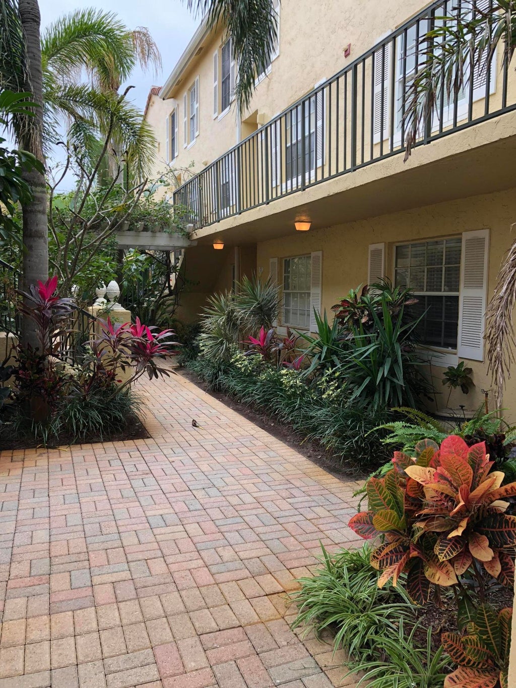 Photo of 1035 LAKE SHORE Drive #103, Lake Park, FL 33403 (MLS # B26067835)