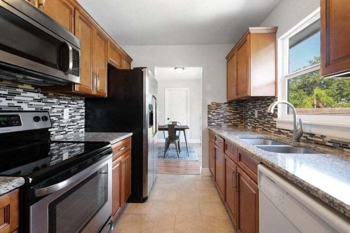 Photo of 2456 SE Melaleuca Boulevard, Port Saint Lucie, FL 34952 (MLS # B26079757)
