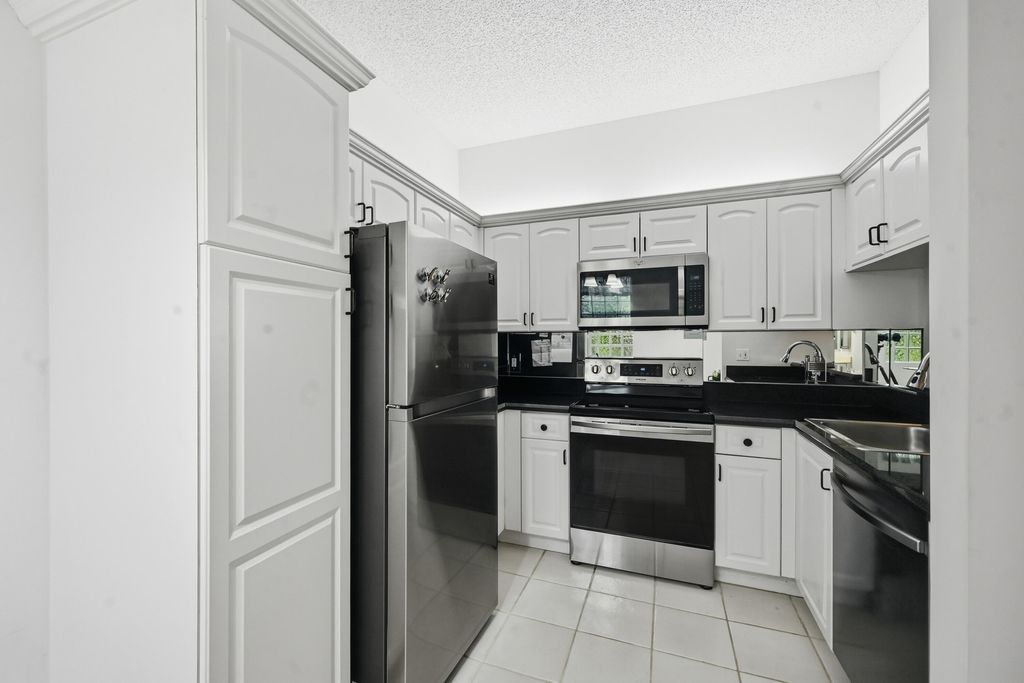 Photo of 5395 Firenze Drive #K, Boynton Beach, FL 33437 (MLS # B26012962)