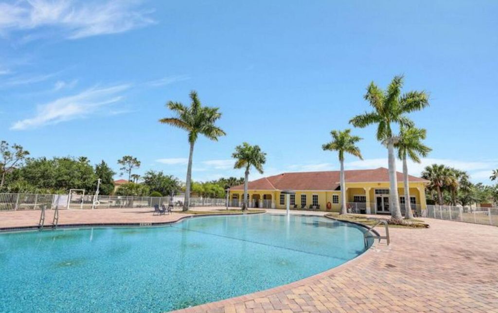 Photo of 9322 Treasure Coast Street, Fort Pierce, FL 34945 (MLS # R11151821)