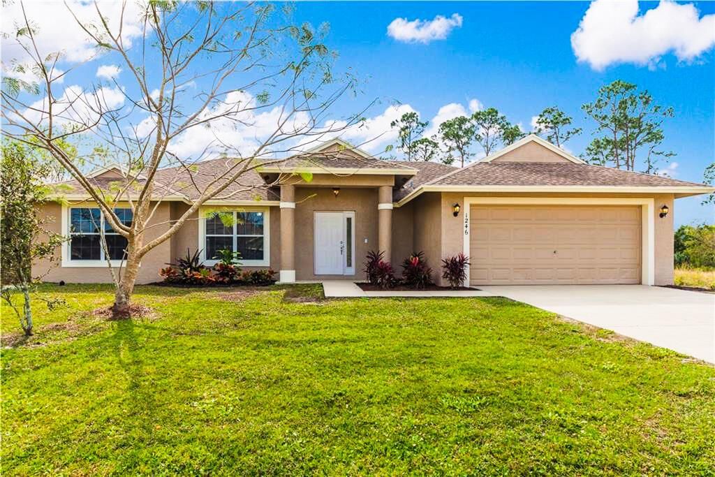 Photo of 1246 SW Santiago Avenue Ave, Port St Lucie, FL 34953 (MLS # R10718655)