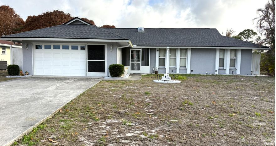 Handman Special Pool Home with No HOA! Great opportunity for an investor or first-time buyers. In need of some TLC, this CBS home offers: 3-BD 2-BA 2-Car Garage, 1,744 SF (living) and 2,640 SF (total), New roof in 2023, A/C 2021 and serviced electrical panel in 2019. Inside it offers, formal dining room, family room with wood fireplace and vaulted ceilings, Kitchen with pass-thru window overlooking the pool, plenty of cabinetry, pantry and lots of natural light. Not to mention the 36'x12' lanai and a spacious screened pool patio. Washer and Dryer and laundry tub (inside the garage), accordion shutter throughout the house for your comfort and safety. Convenient to local stores, Supermarket, Restaurants, public schools, I-95, FL Turnpike and only few minutes to Jensen Beach. Schedule a tour!