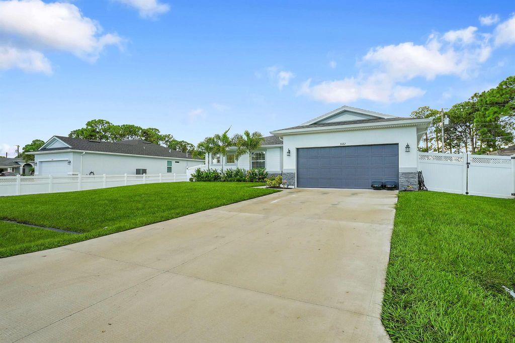 Photo of 3682 SW Margela Street, Port Saint Lucie, FL 34953 (MLS # R11126969)