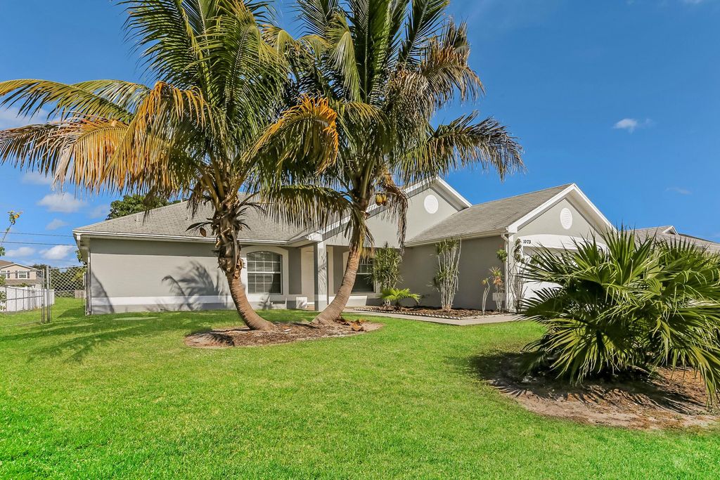 Photo of 1073 SW Firestone Avenue, Port St Lucie, FL 34953 (MLS # R10936760)