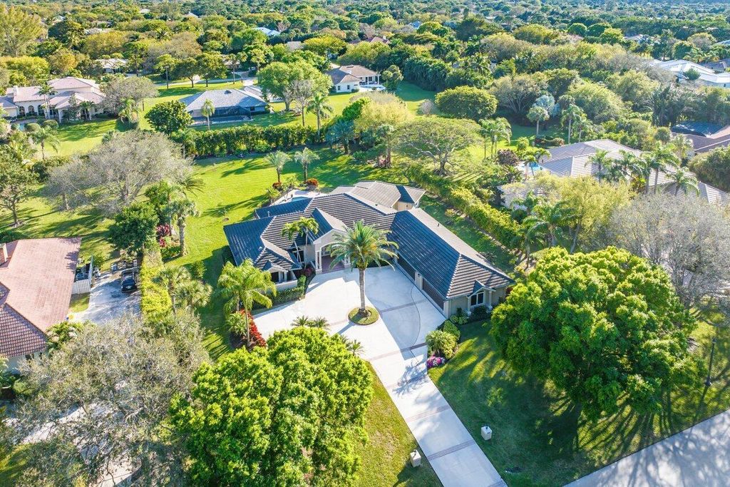 Photo of 5573 High Flyer Road N, Palm Beach Gardens, FL 33418 (MLS # R10964152)