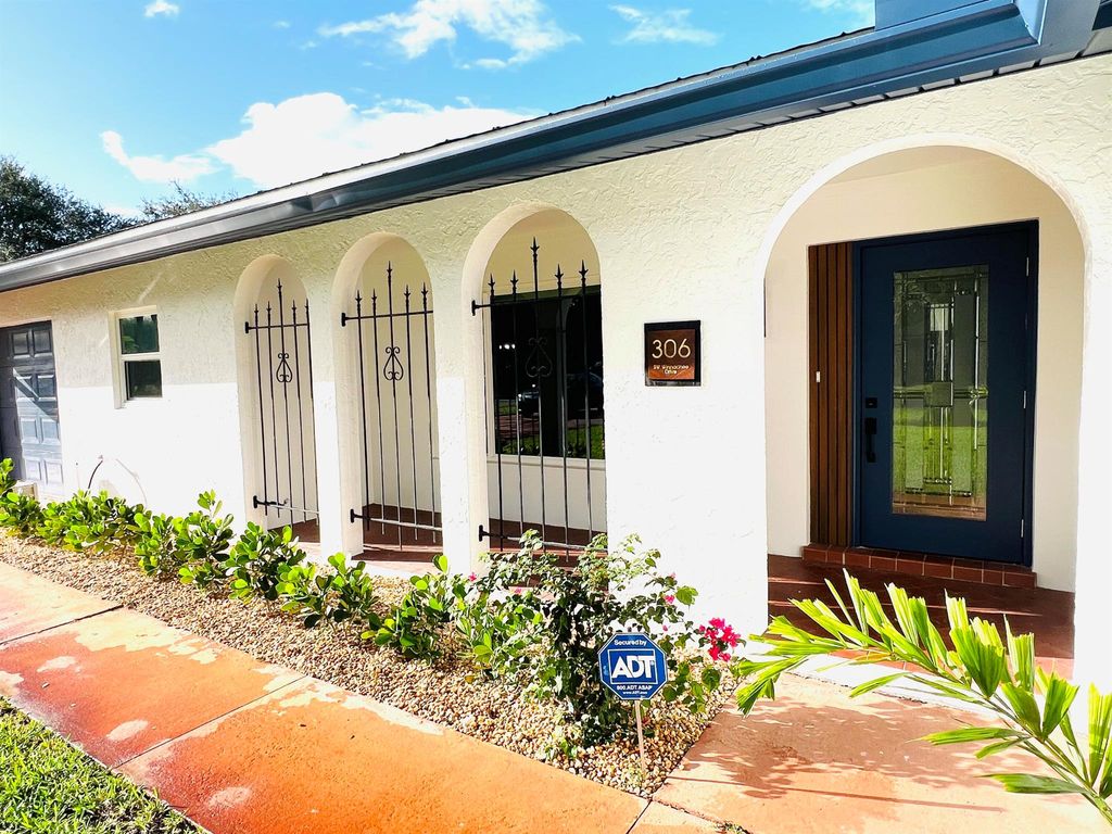 Photo of 306 SW Winnachee Drive, Stuart, FL 34994 (MLS # R10926927)