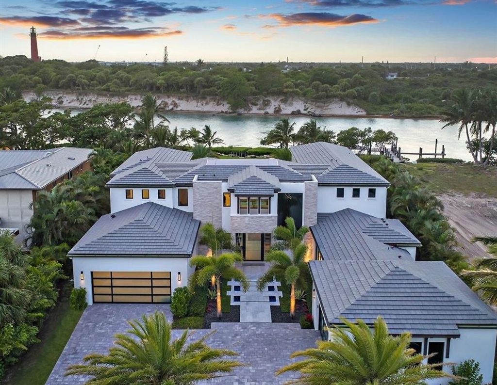 Photo of 102 Lighthouse Drive, Jupiter Inlet Colony, FL 33469 (MLS # R10890546)