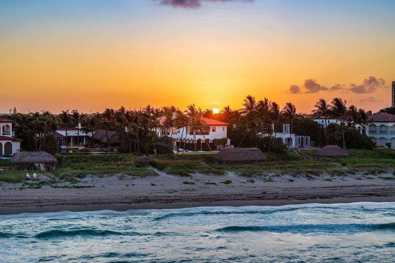 Discover 2367 S. Ocean Blvd Highland Beach, a one-of-a-kind oceanfront estate in the prestigious Byrd Beach section is set on 100 feet of direct ocean frontage with over 600 feet of depth to the water. This estate spans over 12,400 living sqft, with more than 18,000 TSF. The main residence with a brand new roof offers five luxurious en-suite bedrooms, while a separate guest house with three bedrooms, three baths and a living area with kitchen and dual entrances provides the ultimate flexibility for today's contemporary lifestyle. Designed and built by Dan Swanson, this extraordinary property flawlessly merges timeless elegance with modern sophistication, creating a residence that epitomizes both comfort and grandeur.