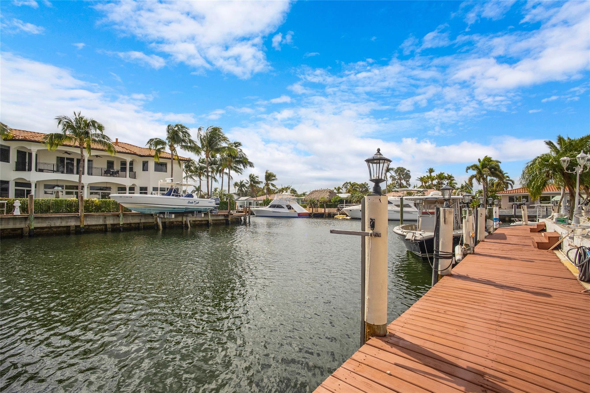 Harbor Village Point Lot has 160 feet of water dockage, is just 10 minutes from the inlet, and is a short walk over the bridge to the beach. This private, secluded, tropical oasis has it all. Nicely remodeled, this 3-bed, 3-bath home has gorgeous views of the water from almost every window, with w/a bonus den/office of the living room. The yard epitomizes Florida waterfront living. All information is believed to be accurate; however, buyers are responsible for verifying its accuracy. Application through Rent Spree