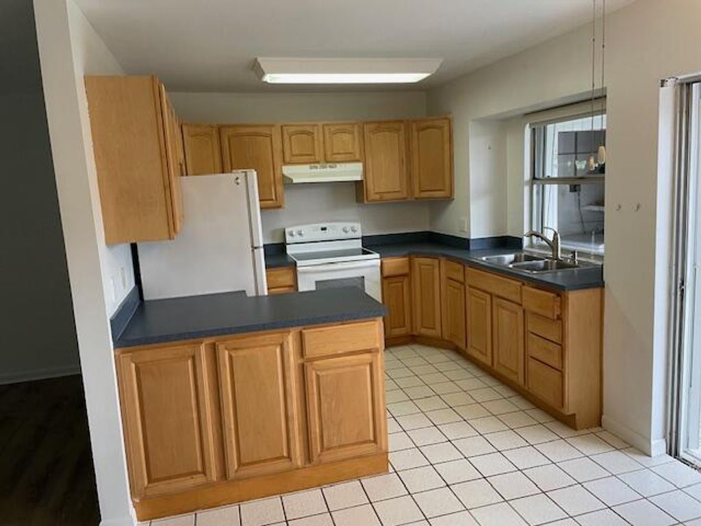 Photo of 3150 Meridian Way S #5, Palm Beach Gardens, FL 33410 (MLS # R11099453)