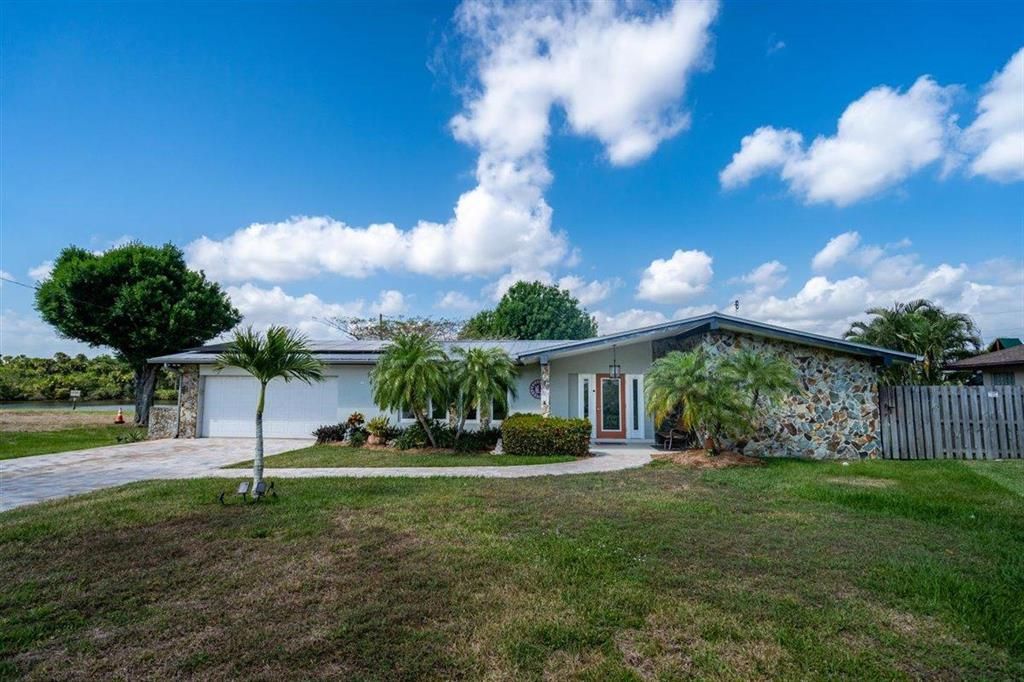 Photo of 308 SE Camino Court, Port Saint Lucie, FL 34952 (MLS # R10701253)