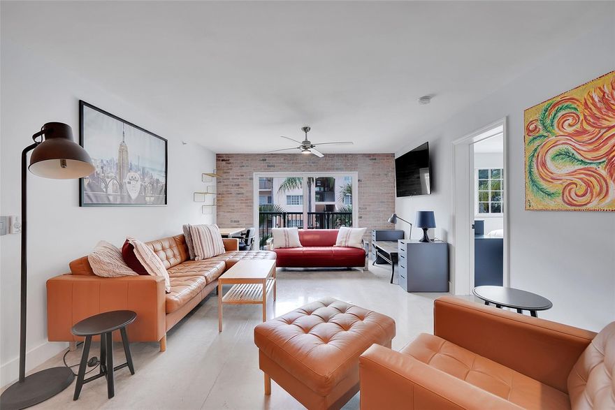 Urban sophistication meets coastal living in this upgraded townhouse-style residence in sought-after Village East, located in the A-Rated Harbordale Elementary District. Featuring polished concrete floors, French-pattern marble entry, and a reclaimed brick accent wall for a modern loft feel. The chef’s kitchen offers GE Black Slate appliances, granite countertops, marble flooring, and under-cabinet lighting. Spa-inspired baths include quartzite counters, custom shower, and freestanding soaking tub. Impact windows, tankless water heater, new electrical & plumbing (2024), smart Ecobee thermostat, and a finished garage with marble epoxy flooring. Gated, pet-friendly community with pool, gym, valet trash, and close access to Publix, LA Fitness, 17th Street—bike to the beach. Use ShowingTime