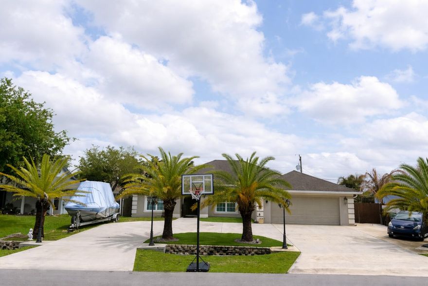 Welcome to this beautifully 5/3 well maintained home in the heart of Port Saint Lucie! This inviting property offers a perfect blend of comfort, space, and Florida living.  Step inside to discover a bright and open floor plan with generous living areas, ideal for both relaxing and entertaining. The home features spacious bedrooms, a well-appointed kitchen with ample cabinetry and counter space, and a cozy dining area perfect for family meals.  Enjoy the Florida lifestyle year-round with a private backyard that offers plenty of room for outdoor gatherings, gardening, or even adding a pool. The property is conveniently close to schools, parks, shopping, and major roadways for easy commuting.