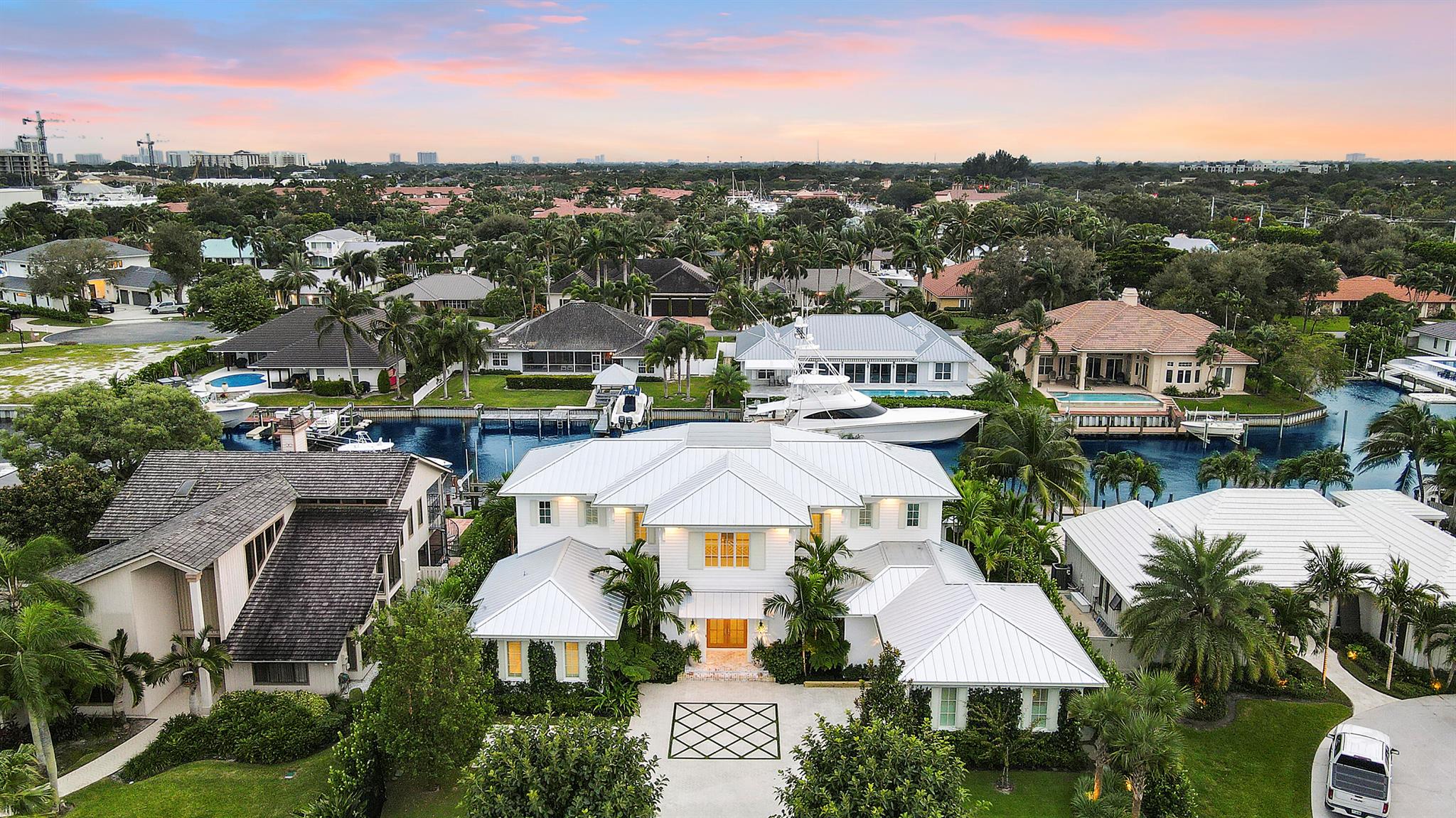 Build your dream estate in the highly coveted Village of North Palm Beach! This custom waterfront property presents a rare opportunity to own nearly an acre (0.8335 acres) with 107 feet of prime water frontage on the scenic Earman River. Custom architectural plans by renowned luxury builder Foster Banyan Building & Development envision an elegant residence with 5 bedrooms, 5 full baths, 2 half baths, an office, and a den, all within 5,180 A/C sq. ft. and 7,508 total sq. ft. Unique to this property, the oversized lot allows for design flexibility, including an optional 1,000 sq. ft. casita(estimated $650,000) or additional garage. The casita design offers a private 1-bedroom, 1-bath guest retreat with family room, morning bar, separate laundry, and a breezeway connection to the main home.