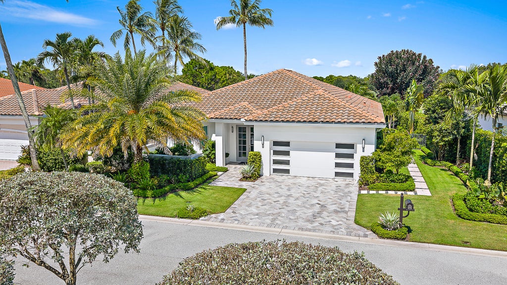 Photo of 134 Golf Village Boulevard, Jupiter, FL 33458 (MLS # R11108318)