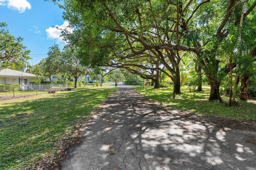 Incredible family estate in Lake Ida in East Delray by well known architect.