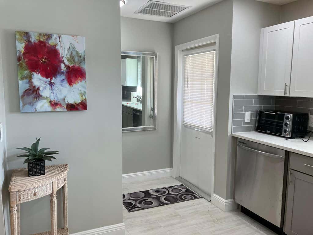 Photo of 214 DOWN EAST Lane, Lake Worth, FL 33467 (MLS # B26060044)